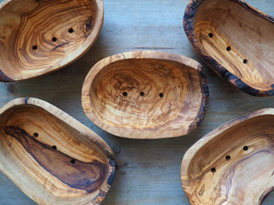 All natural, handmade soap dishes from olive wood. In a bowl shape with three holes on the bottom for draining the water.
